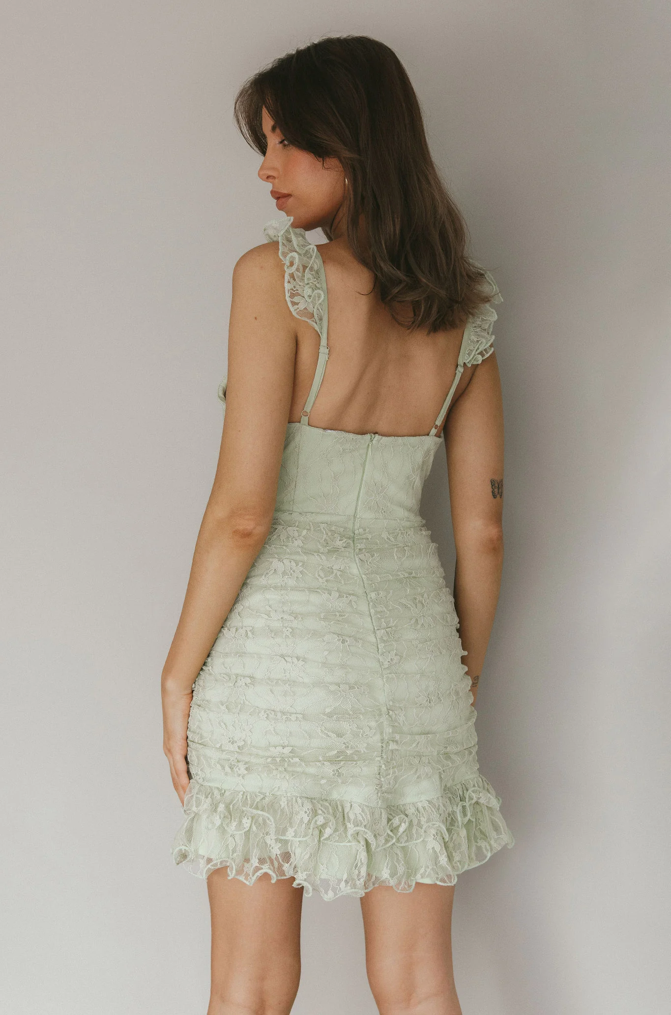 Kaley Ruched Side Layered Frill Hem Lace Mini Dress Sage - Image 2