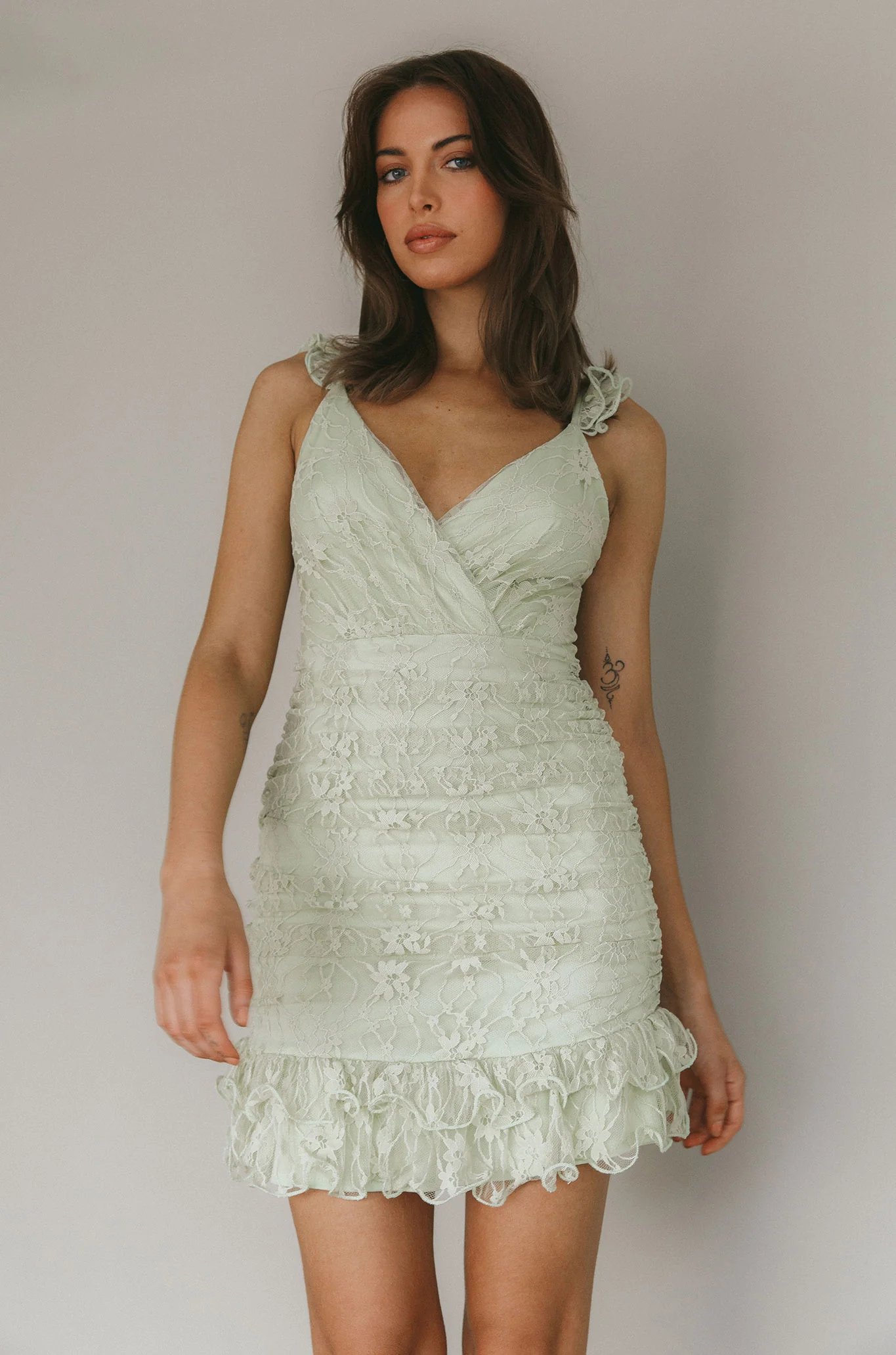 Kaley Ruched Side Layered Frill Hem Lace Mini Dress Sage - Image 9